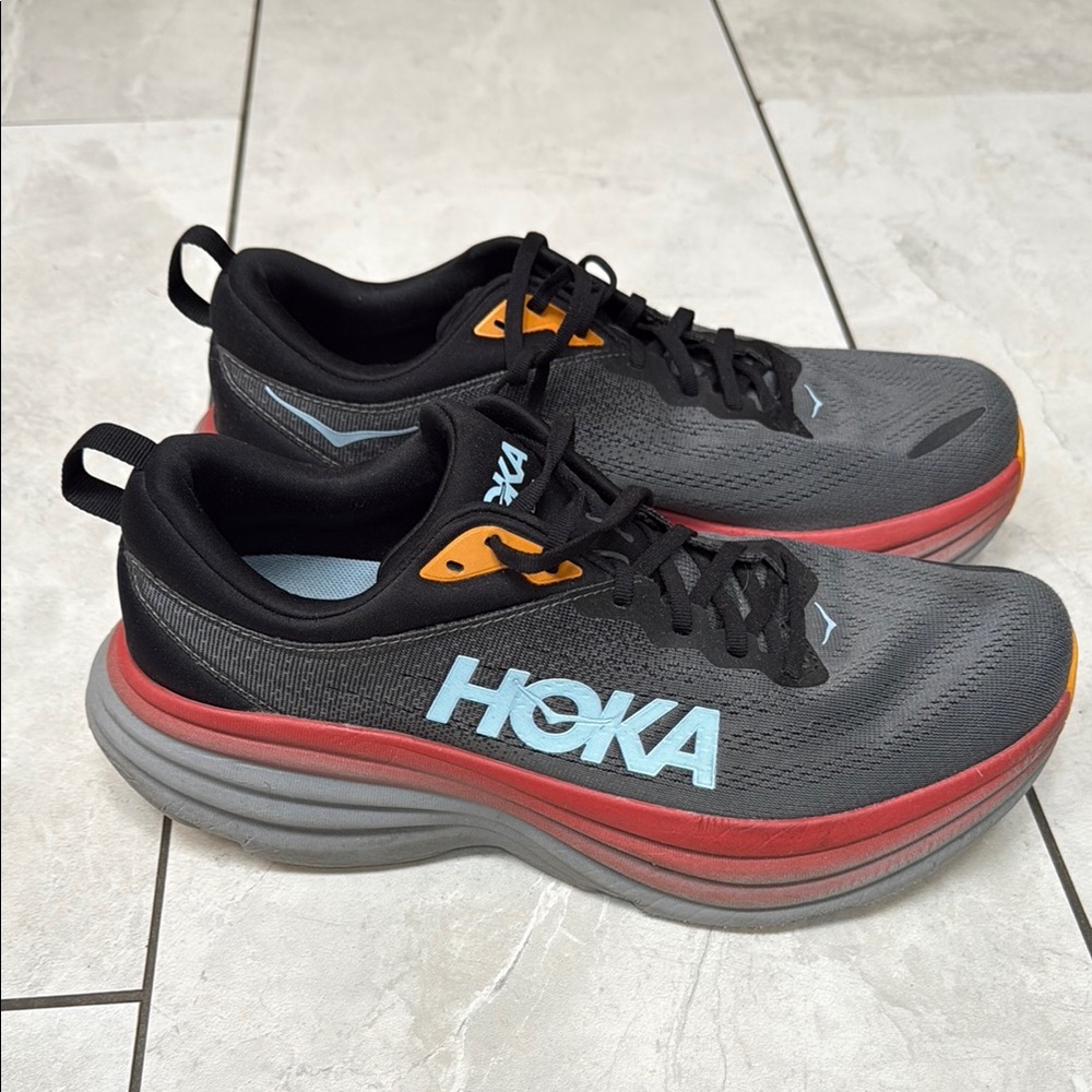 Hoka Men's Black and Orange Athletic Shoes, only works a few times
